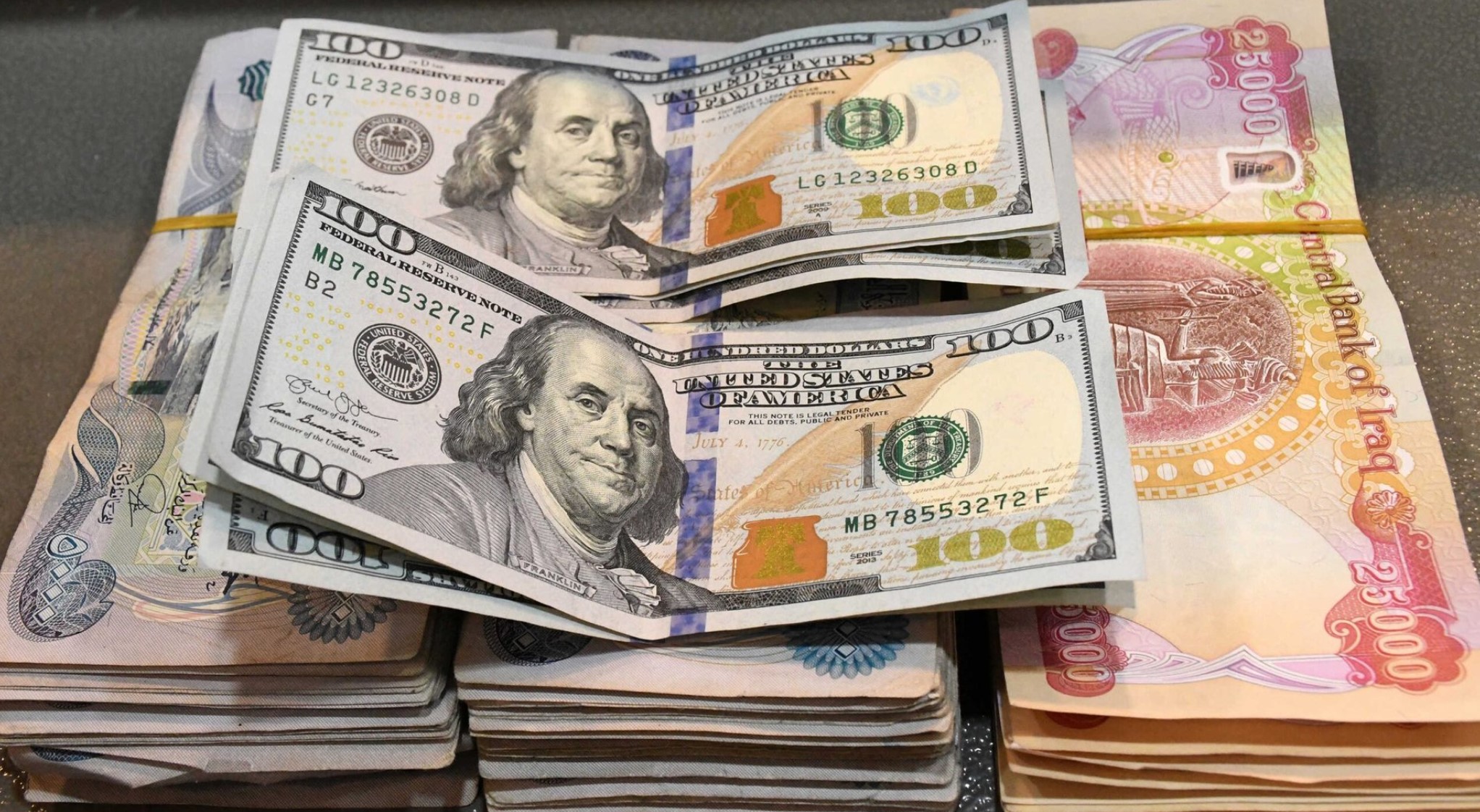 قائمة بأسعار صرف الدولار في بغداد وأربيل والبصرة